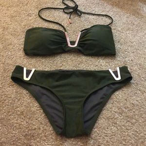 Green bikini with metal accents. NWOT